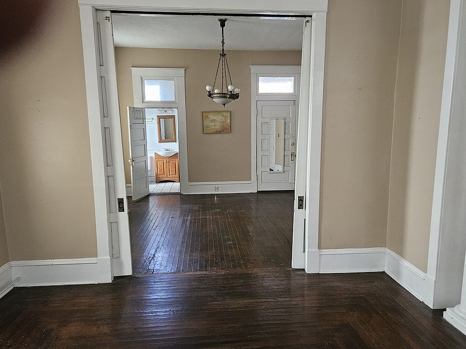 Living room, sliding doors, bedroom, bath