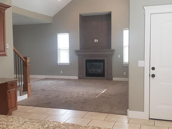 Vaulted ceiling in family living room, large dining area