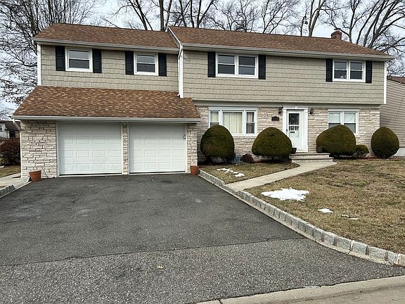 This spacious apartment extends the full length of the house, offering ample room and a well-designed layout.