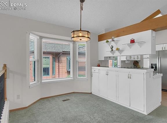 Dining area has bay window