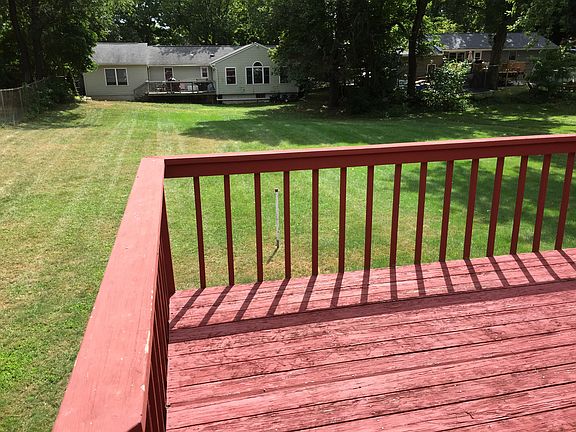 Deck overlooking backyard