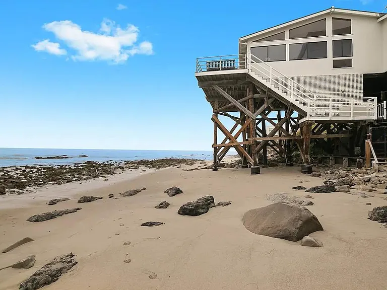 We take beachfront literally. One flight of stairs is all that lies between you, the sand, and the surf.