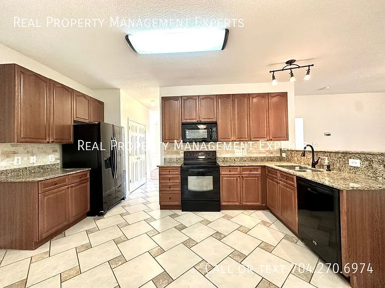 4775 Covington Dr NW — Photo 4
