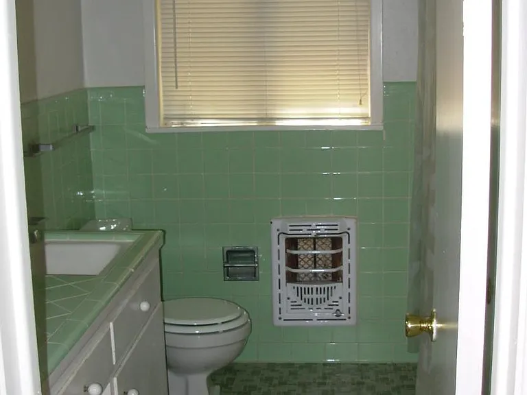 Main Bathroom with Tiled Counters and Floors