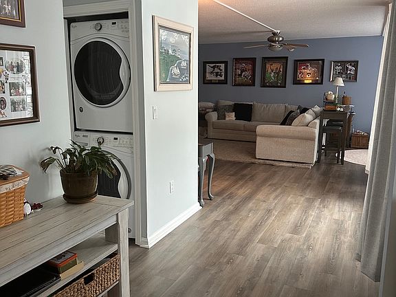 in-unit laundry and spacious hallway.