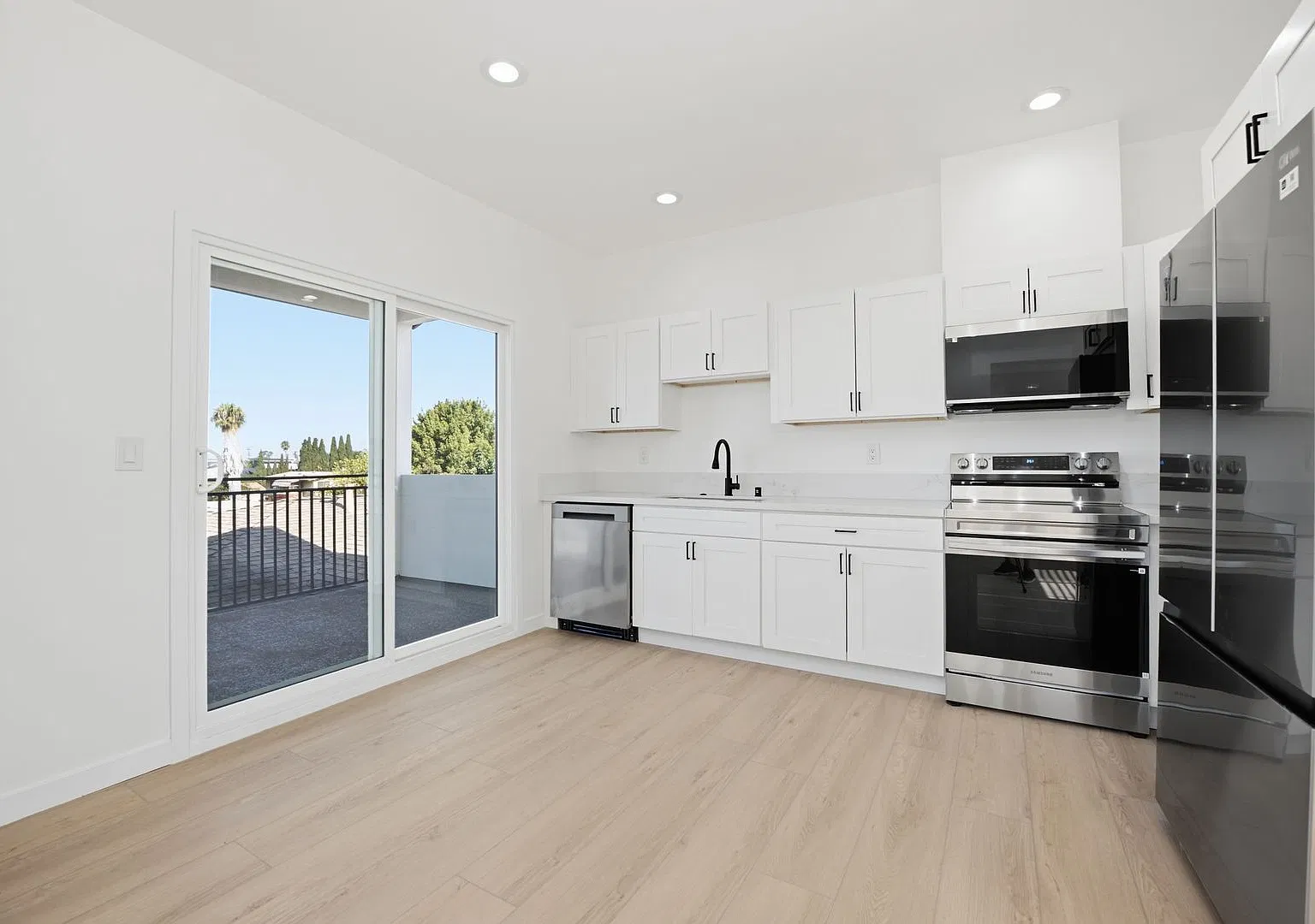 Brand New 3 Bed / 3 Bath with Private Balcony and In-Unit Laundry — Photo 4