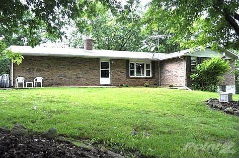 Welcome to this basement home on 10acres with a 2 car detached garage/shop.