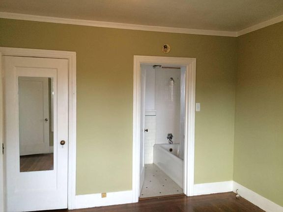 Bedroom with bathroom and two closets