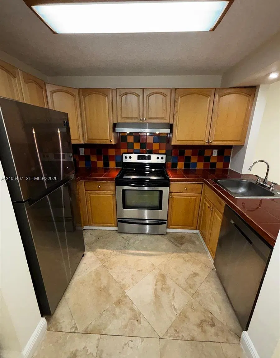 Palm Gardens Condo — Photo 4