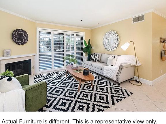 Living Room Area. Actual furniture is different and this is a representative view only.