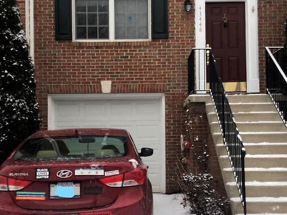 Quick shot of the front of the house (garage and driveway can be seen)