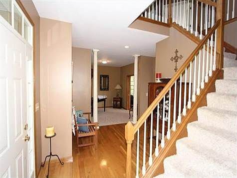 Upon entrance to this home you will find the beautiful foyer with hardwood flooring and the open staircase to the upper level.