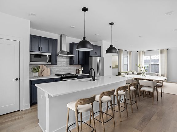 Stylish Kitchen w Dedicated Dining Space