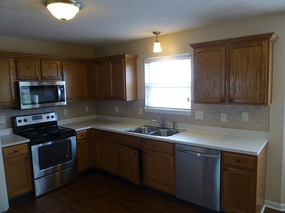 Updated Kitchen with stainless steel appliances, new sink; n