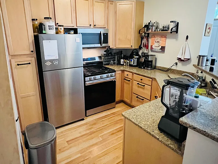 New stainless steel appliances with Cambria counter tops.