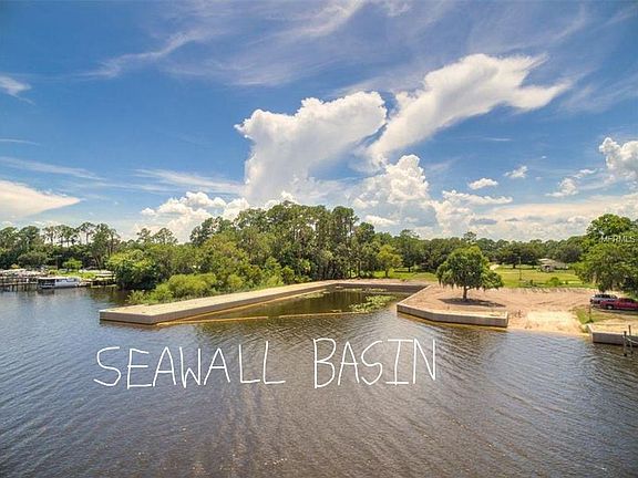 Property Aerial From Lake
