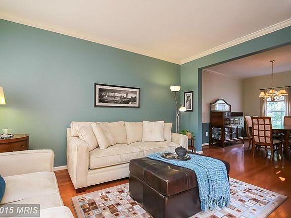 Formal living room with crown molding