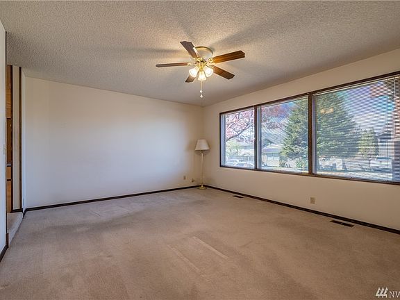 Living room with peeks of mountain views.
