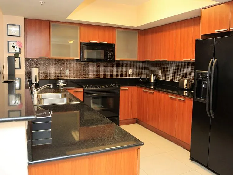 Kitchen with Dishwasher, Disposal, Microwave and Refrigerator