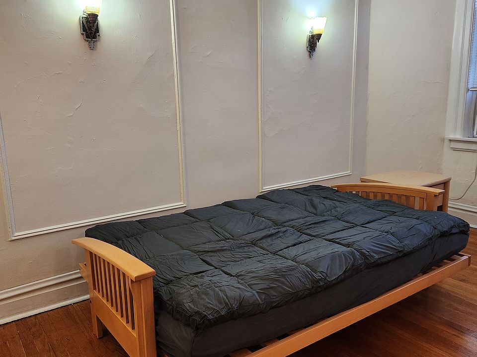 Futon converts to bed. The futon bed contains an additional mattress topper.