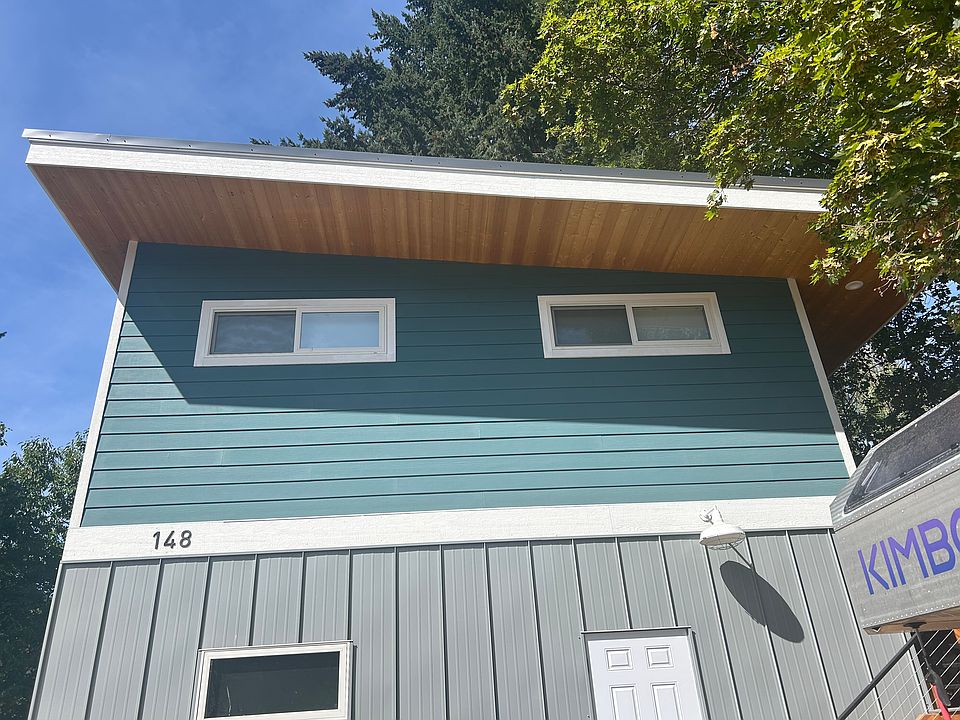 Unit is above garage. There are bigger windows on another side (to the left/west)