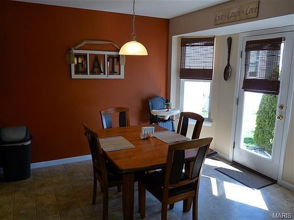 Breakfast room has bay window and french door to oversized patio.
