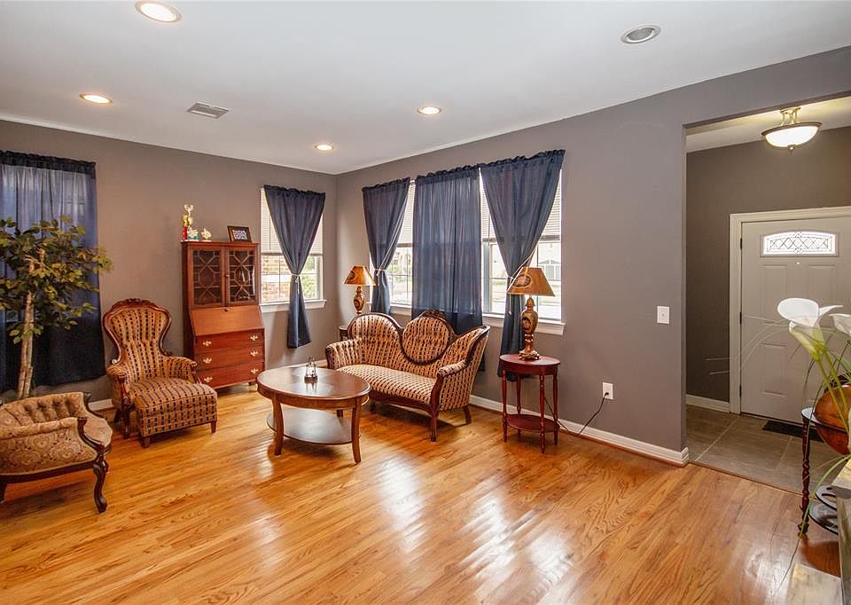 Large living area with beautiful hardwood floors