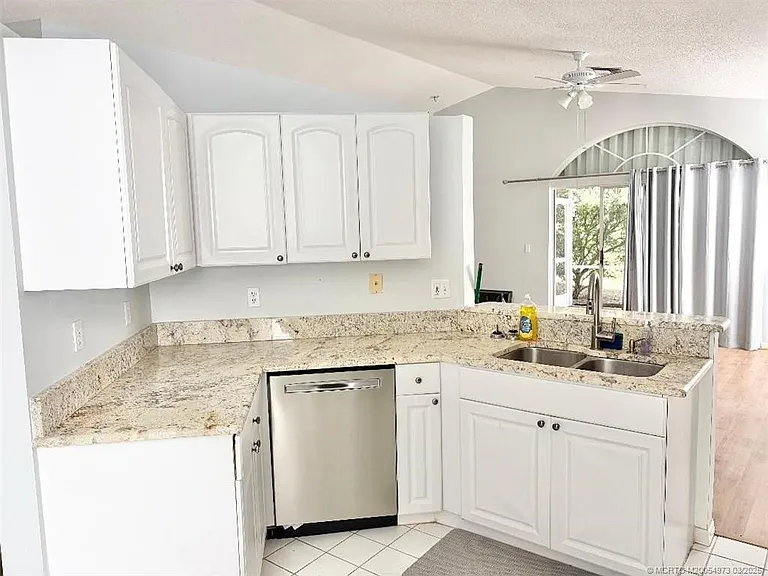 3486 SW Pindo Palm Ln — Photo 10