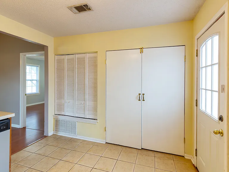 Double doors to washer/dryer connections