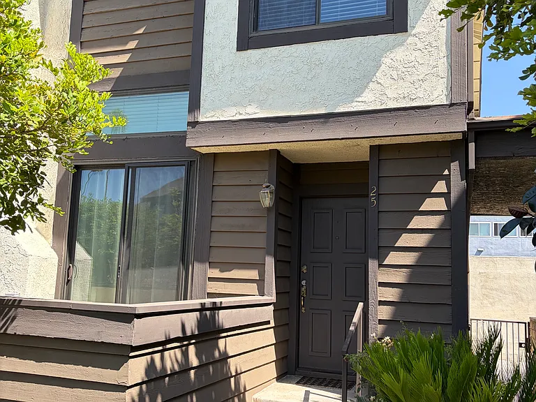 Corner unit with front patio