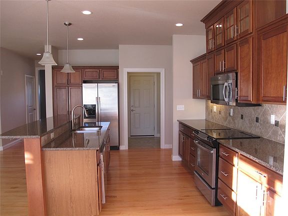 Kitchen - stainless appliances, refrig stays