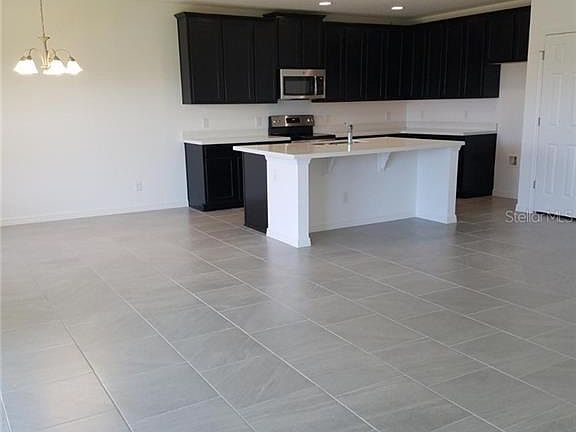 3rd image of 5611 Windsong Oak Dr
