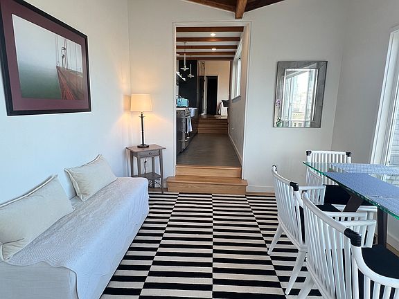 Walk into the dining/sitting area with sweeping views