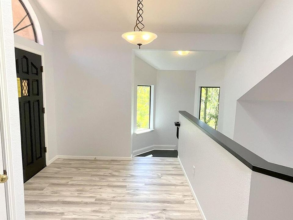 Entry with new LVP flooring and fresh paint