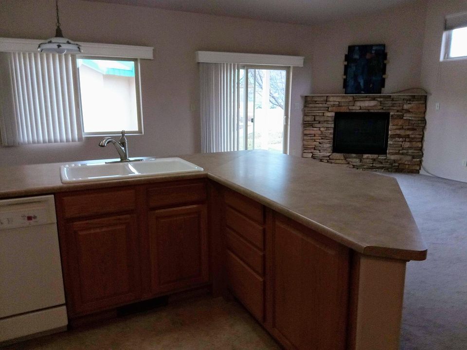 open concept full kitchen, dining room, living room