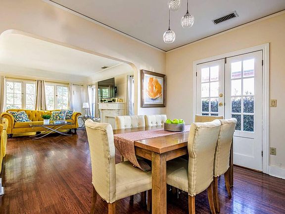Dining room area with a French door leading to the backyard