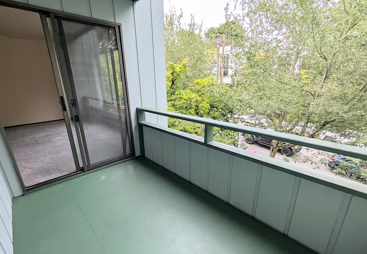 Balcony faces east, high above street level - 3805 Fremont Ave N #203