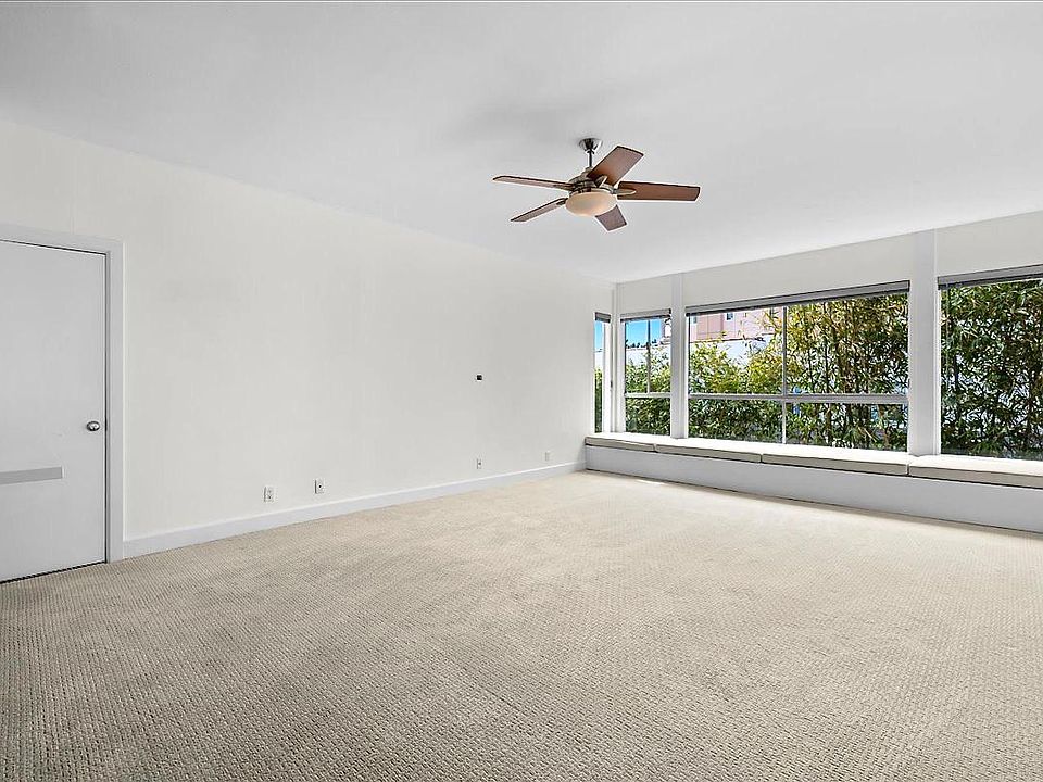 Extra-spacious zen living room with northwest-facing side ocean views.