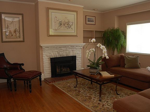 Living room with gas fireplace.