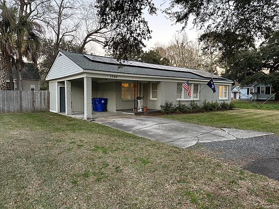 Side of House from Pinecrest showing additional parking on grass