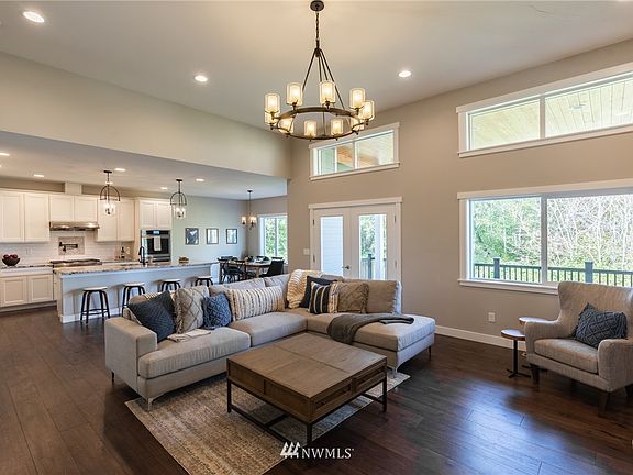Lots of light from the big windows looking out onto the covered deck