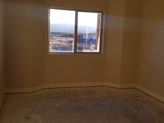 Tall ceilings in bedroom.
Carpet