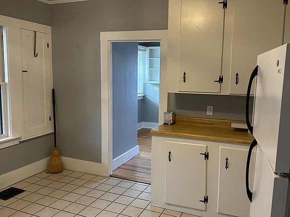 View of kitchen from front door