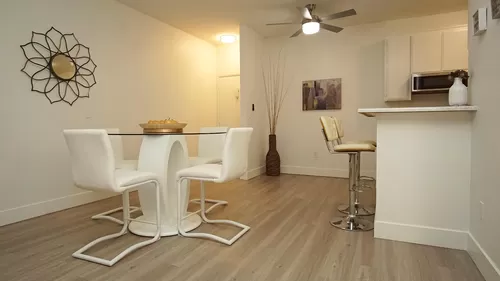 Each apartmetnt features a dining area - Halsted Landmark Apartments