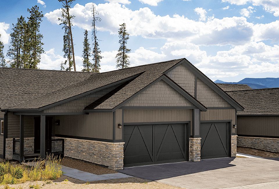 Beautiful triplex townhome with main floor living, stunning two story deck not shown