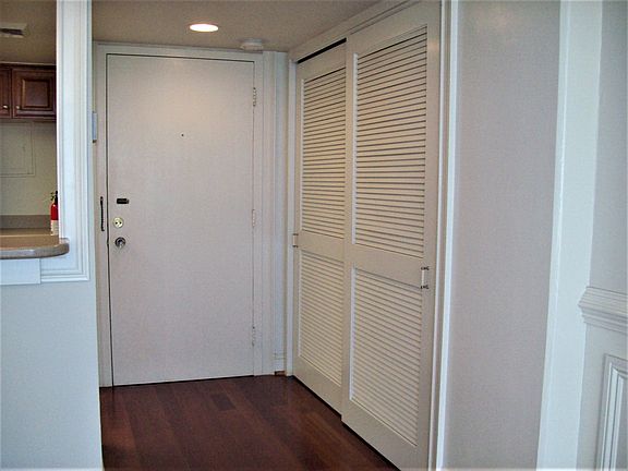 entrance door. utility closet to the right.