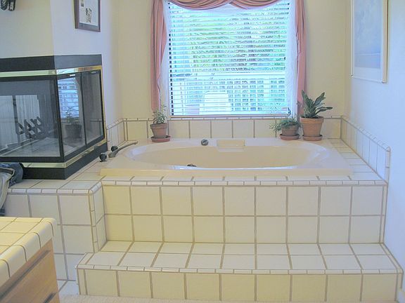 jacuzzi and 2nd fireplace