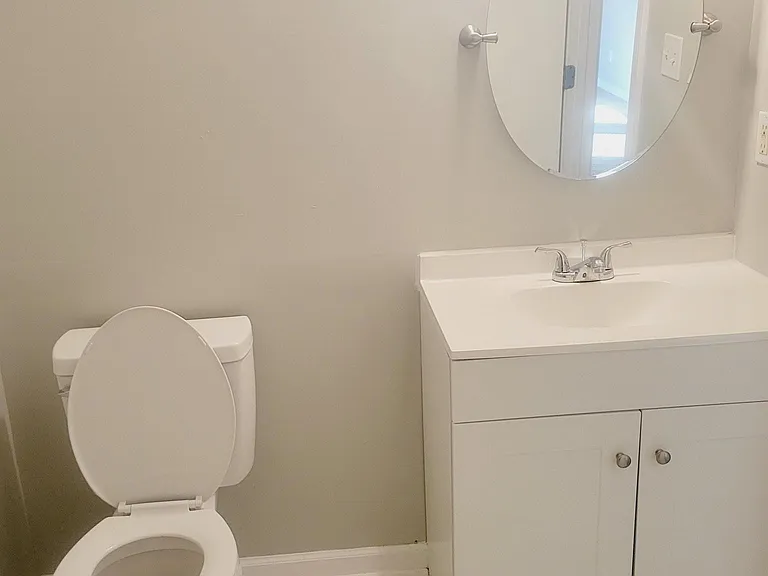 Main Bath with Frameless Titling Mirror