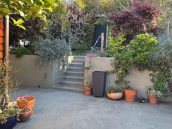 Steps down from main street entrance into front yard.