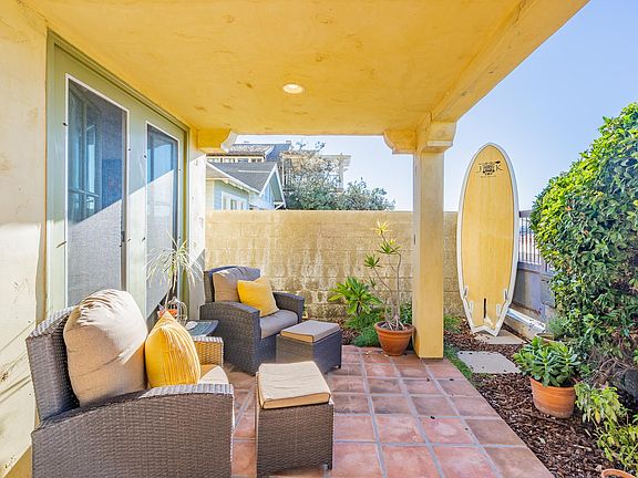 First floor patio with direct beach access. Beach toys, boogie boards and beach towels are provided.